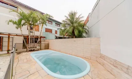 Casa com 3 quartos à venda na Rua Torre de Pedra, --, Espírito Santo, Porto Alegre por R$ 980.000