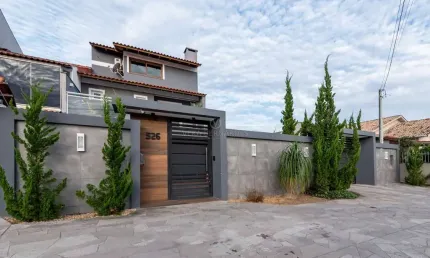 Casa com 3 quartos à venda na Rua Baldoino Bottini, --, Hípica, Porto Alegre por R$ 1.500.000