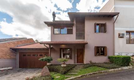 Casa em condomínio fechado com 4 quartos à venda na Avenida Vicente Monteggia, --, Cavalhada, Porto Alegre por R$ 1.330.000