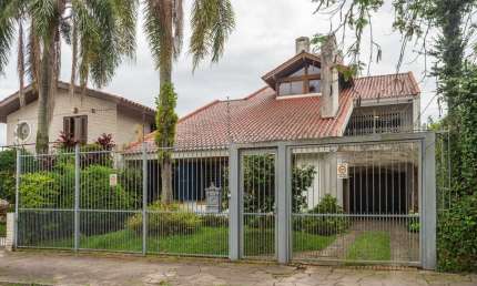 Casa com 4 quartos à venda na Rua Engenheiro Coelho Parreira, 520, Ipanema, Porto Alegre por R$ 1.200.000