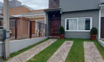 Casa com 3 quartos à venda na Rua Wilson Conceição Bona, --, Hípica, Porto Alegre por R$ 570.000