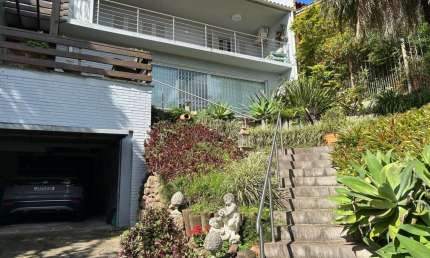 Casa com 3 quartos à venda na Rua Edgar Luiz Schneider, 480, Jardim Isabel, Porto Alegre por R$ 1.250.000