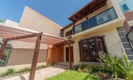 Casa com 3 quartos à venda na Rua Roberto Santini, --, Hípica, Porto Alegre por R$ 650.000