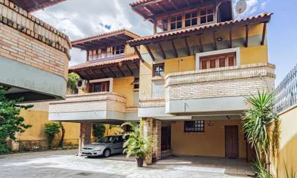 Casa em condomínio fechado com 3 quartos à venda na Avenida Coronel Marcos, --, Pedra Redonda, Porto Alegre por R$ 730.000