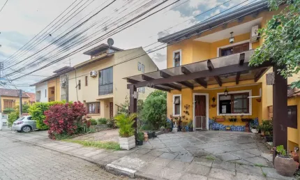 Casa em condomínio fechado com 2 quartos à venda na Avenida Edgar Pires de Castro, --, Hípica, Porto Alegre por R$ 600.000