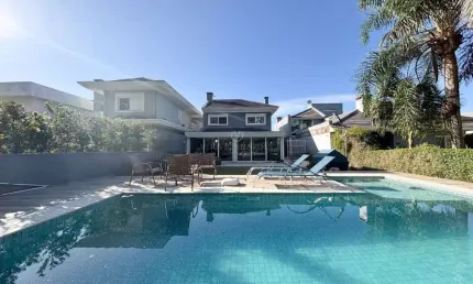 Casa em condomínio fechado com 3 quartos à venda na Avenida Juca Batista, --, Belém Novo, Porto Alegre por R$ 1.987.000