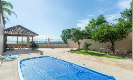Casa com 4 quartos à venda na Rua Alcebíades Antônio dos Santos, --, Nonoai, Porto Alegre por R$ 1.900.000