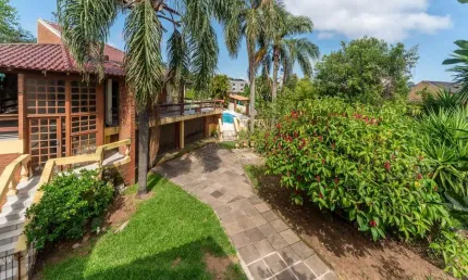 Casa com 3 quartos à venda na Rua Doutora Noemi Valle Rocha, 295, Serraria, Porto Alegre por R$ 1.400.000