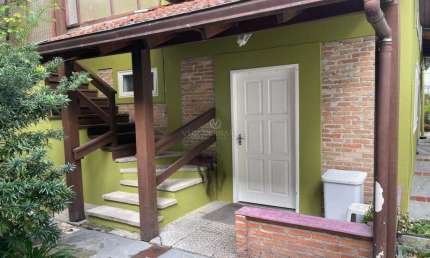 Casa com 3 quartos à venda na Rua Iete, 454, Tristeza, Porto Alegre por R$ 1.000.000