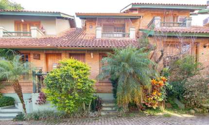 Casa em condomínio fechado com 2 quartos à venda na Avenida da Cavalhada, 6021, Cavalhada, Porto Alegre por R$ 498.000