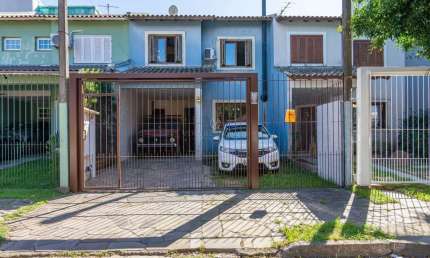 Casa com 3 quartos à venda na Rua Rodolpho Espinoza, --, Hípica, Porto Alegre por R$ 600.000
