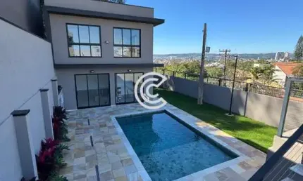Casa em condomínio fechado com 3 quartos para alugar na Alameda Carlos de Carvalho Vieira Braga, 470, Chácaras Alpina, Valinhos por R$ 6.800