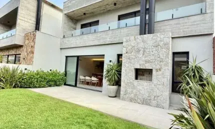 Casa com 4 dormitórios à venda, 220 m² por R$ 2.280.000,00 - Sunset - Xangri-lá/RS