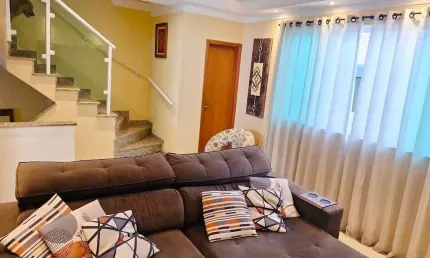 Sobrado com 3 dormitórios à venda, 116 m² por R$ 630.000,00 - Macuco - Santos/SP