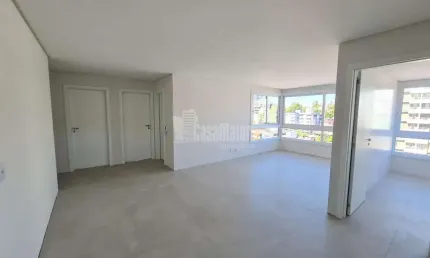 Apartamento Central de 02 dormitórios com suíte e 01 vaga de garagem