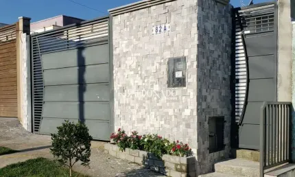 Casa em extrema mg com 2 dormitórios sendo 1 suíte 2 vagas de garagem