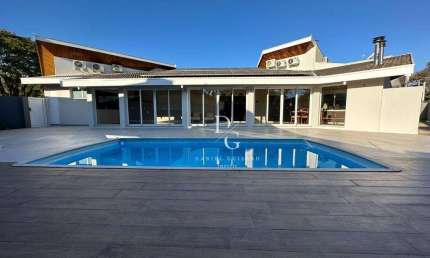 Casa com 5 dormitórios à venda, 430 m² por R$ 4.950.000,00 - Condomínio Vale do Sol - Tremembé/SP