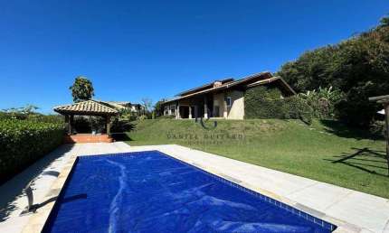 Casa com 3 dormitórios, 300 m² - venda por R$ 2.200.000,00 ou aluguel por R$ 8.693,00/mês - Chácaras Cataguá - Taubaté/SP