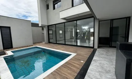 Maravilhoso sobrado com 4 suítes ,com piscina aquecida