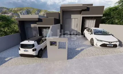 Casa com passagem lateral à venda no bairro Volta Grande em Brusque/SC