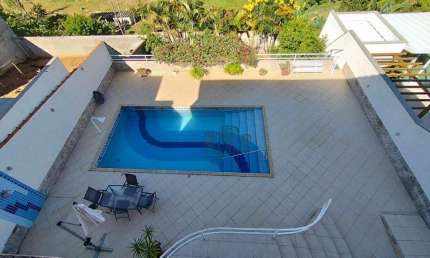 Casa com 5 Quartos à venda, 460 m²  em Condomínio Fechado