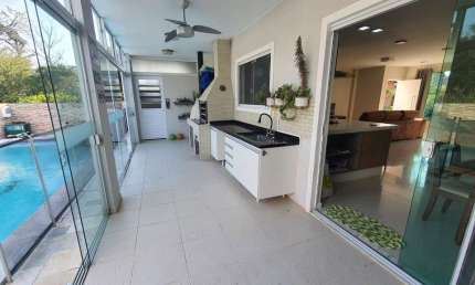 Casa em condomínio fechado com 4 quartos à venda na Avenida Luiz Boiteux Piazza, 4256, Cachoeira do Bom Jesus, Florianópolis, 224 m2 por R$ 2.105.000