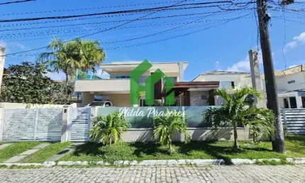 Casa de luxo à venda em condomínio exclusivo em Lauro de Freitas-BA, 4 suítes, 4 vagas, 242m² de área!