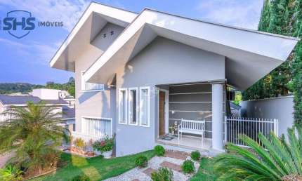 Casa em condomínio fechado com 3 dormitórios à venda, 214 m² por R$ 1.699.000
