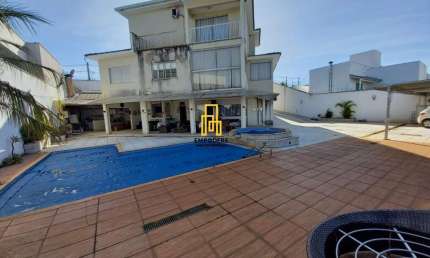 Casa para Venda em Uberlândia, Vigilato Pereira, 5 dormitórios, 3 suítes, 4 banheiros, 9 vagas