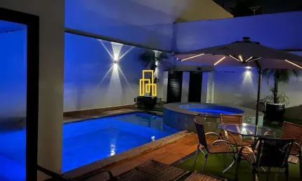 Casa para Venda em Uberlândia, Tabajaras, 3 dormitórios, 3 suítes, 4 banheiros, 2 vagas