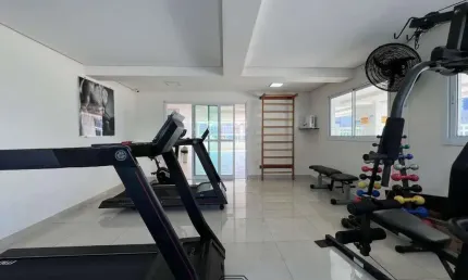 Apartamento de 2 quartos com 2 suítes à venda em Praia Grande-SP, bairro Caiçara, 80m² e vaga de garagem.