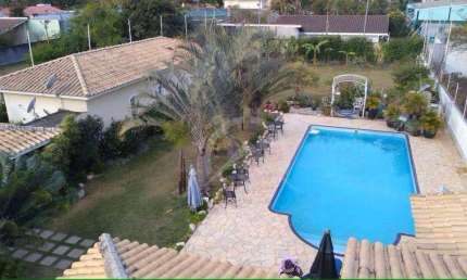 Casa com 6 dormitórios, 350 m² - venda por R$ 2.300.000,00 ou aluguel por R$ 15.800,00/mês - Vila Loanda - Atibaia/SP