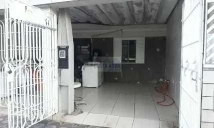 Casa no Jardim Independência com 4 quartos, sala, 2 banheiros e garagem para 3 carros