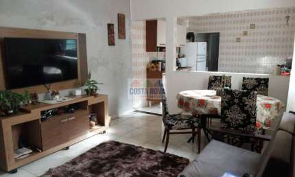 Casa a venda com 3 quartos, 3 banheirso e 2 vagas de garagem na Mirim em Praia Grande- SP