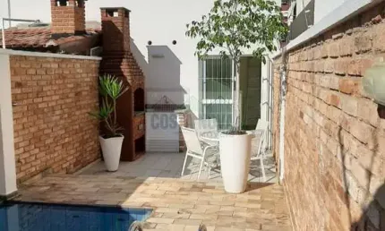 Linda casa sobreposta alta com 3 suítes, piscina e churrasqueira no bairro Campo Grande