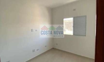 Casa em condomínio à venda com 57m², com 2 quartos, 1 sala, 2 banheiros e 1 vaga em Praia Grande