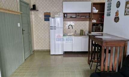 Kitnet à venda com 40m², 1 quarto, 1 banheiro e 1 vaga no bairro Tupi em Praia Grande frente ao mar