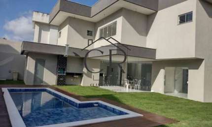 Casa em condomínio fechado com 5 quartos à venda na Rua Abrolhos, Alphaville (Abrantes), Camaçari