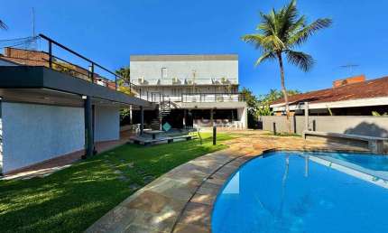 Casa à venda em condomínio fechado na Praia da Enseada, Guarujá, SP | Qvista inteligência Imobiliár