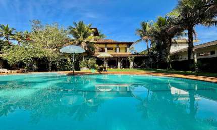 Casa de Luxo Estilo Colonial com 7 Suites à venda, Jardim Acapulco no Guarujá | QVista Inteligência