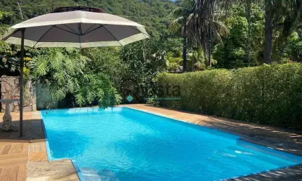 Casa à venda no Guaiúba no Guarujá, SP | QVista Inteligência Imobiliária Guarujá.