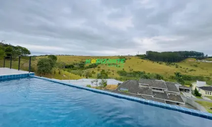 Casa à venda com terreno de 2000m² , 350m² de área construída, com 3 suítes no condomínio Mirante d