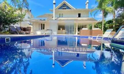 CASA ALTO PADRÃO COM 4 DORMITÓRIOS À VENDA NO CONDOMÍNIO PRAIA MOLE
