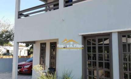 Casa com 4 dormitórios à venda, 250 m² por R$ 620.000 - Coloninha - Araranguá/SC