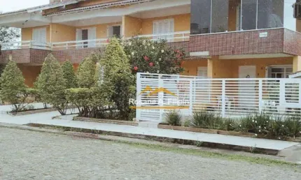 Casa com 3 dormitórios à venda, 156 m² por R$ 550.000 - Capão da Canoa/RS