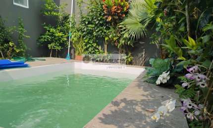 Casa com piscina à venda em Ilha Comprida/SP no Balneário Atlântico com escritura e averbação da casa na matrícula possibilitando financiamento bancário