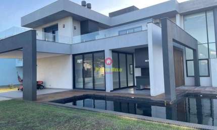 Casa em condomínio fechado com 5 quartos à venda no Atlântida Sul (Distrito), Osório , 419 m2 por R$ 3.990.000