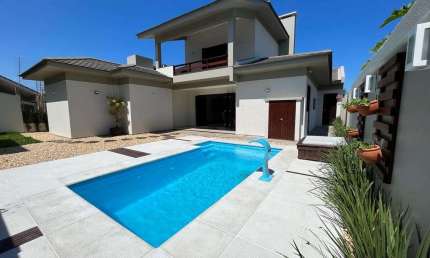 Casa com 4 quartos à venda na Rua Miraguaia, 505, Atlântida, Xangri-Lá, 270 m2 por R$ 1.980.000