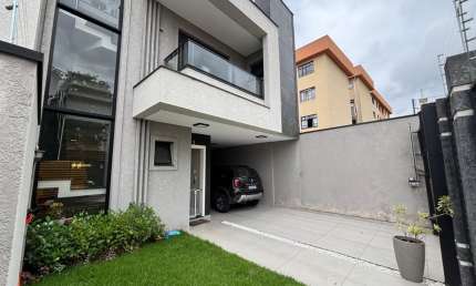 Descubra seu novo lar: Tríplex exclusivo no bairro Boa Vista, Curitiba!