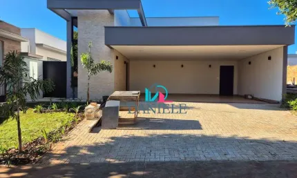 Casa térrea com 3 suítes localizada no condomínio Quinta das Tipuanas.